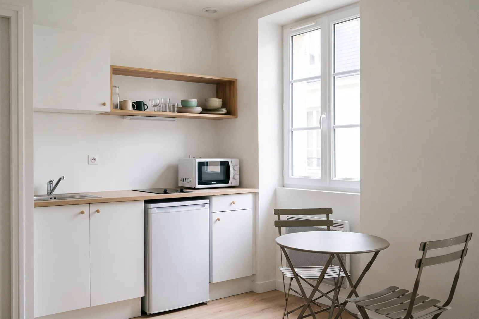 Coin cuisine équipé d'un studio loué meublé